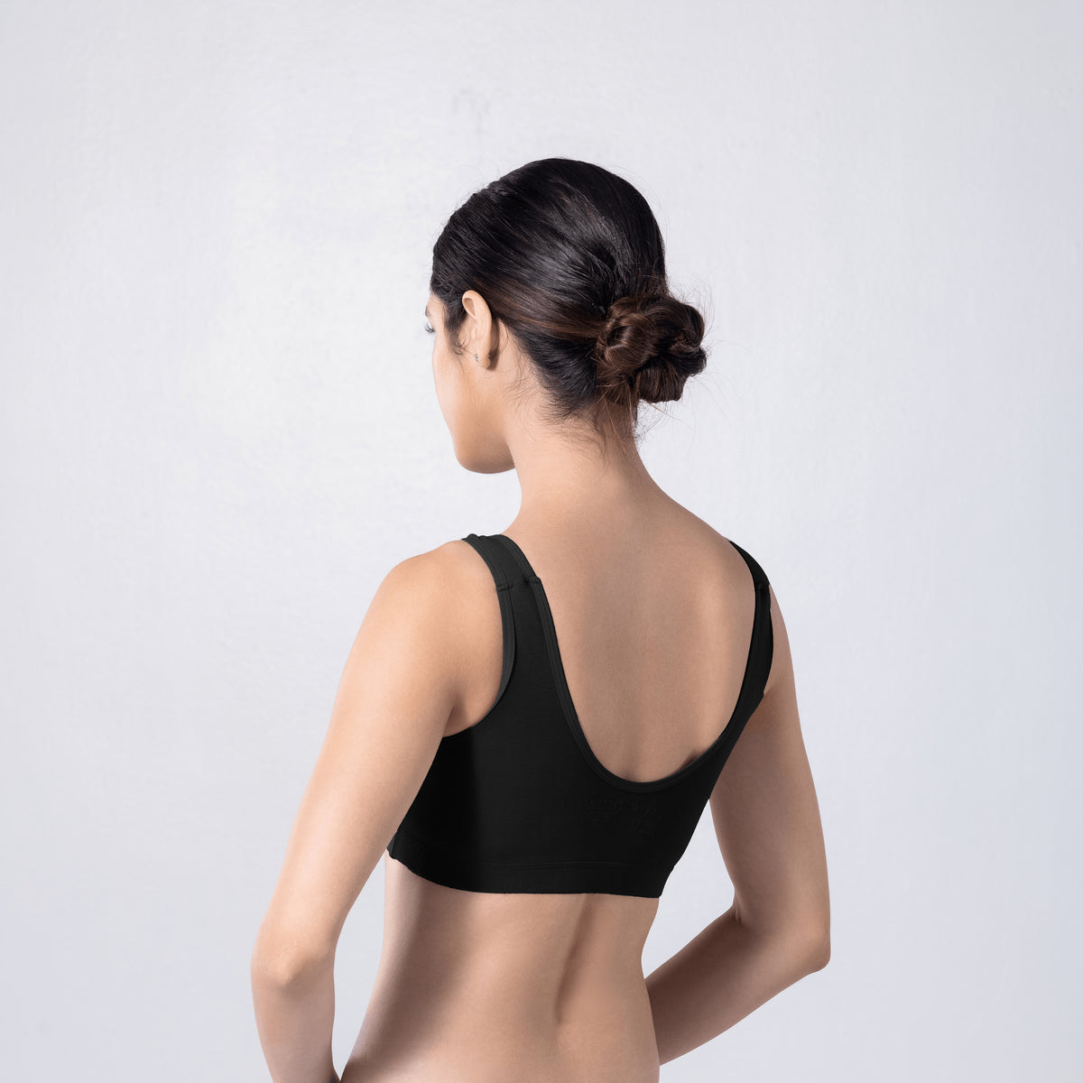 LadyO Cool Active Bra in Black, three-quarter back view worn by model.