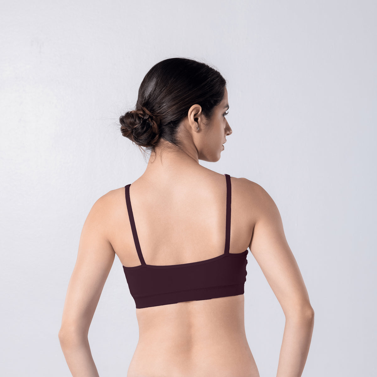 Feel Active Bra in Wine, back view worn by model.