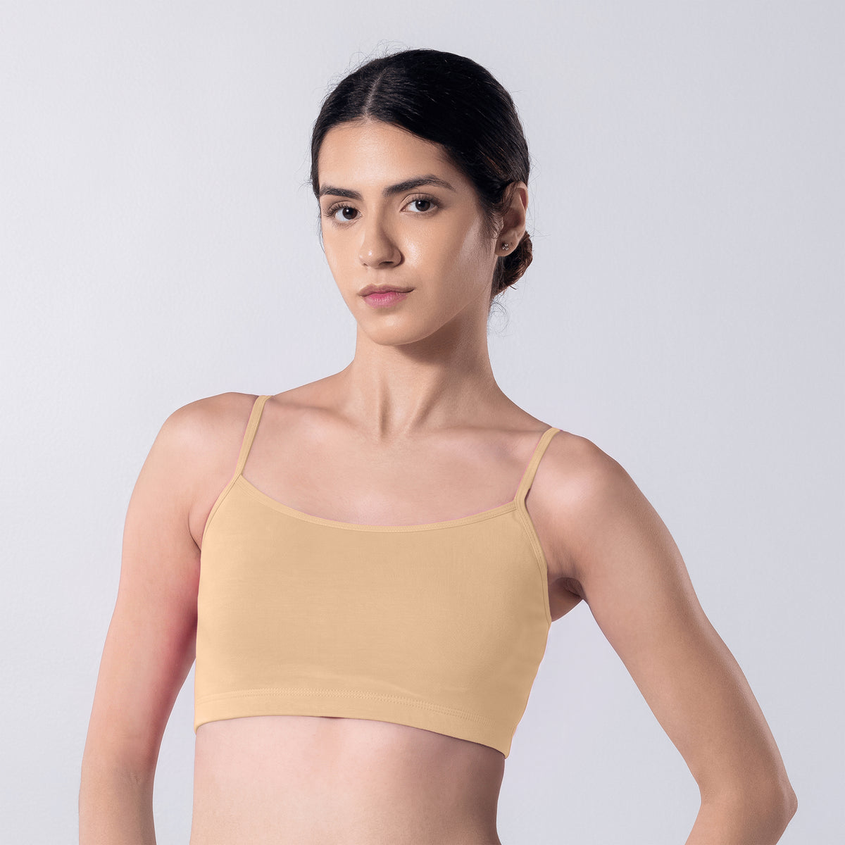 Blush Trendy Top Bra in Skin, side view worn by model.