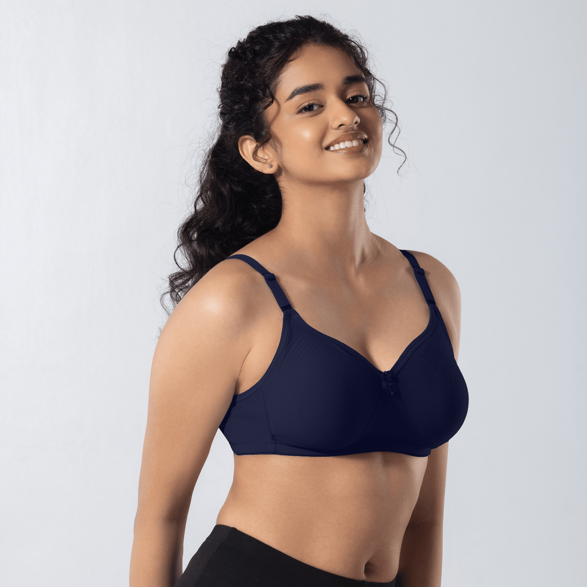 Emika-C Plus Bra in Navy, side-front view worn by model.