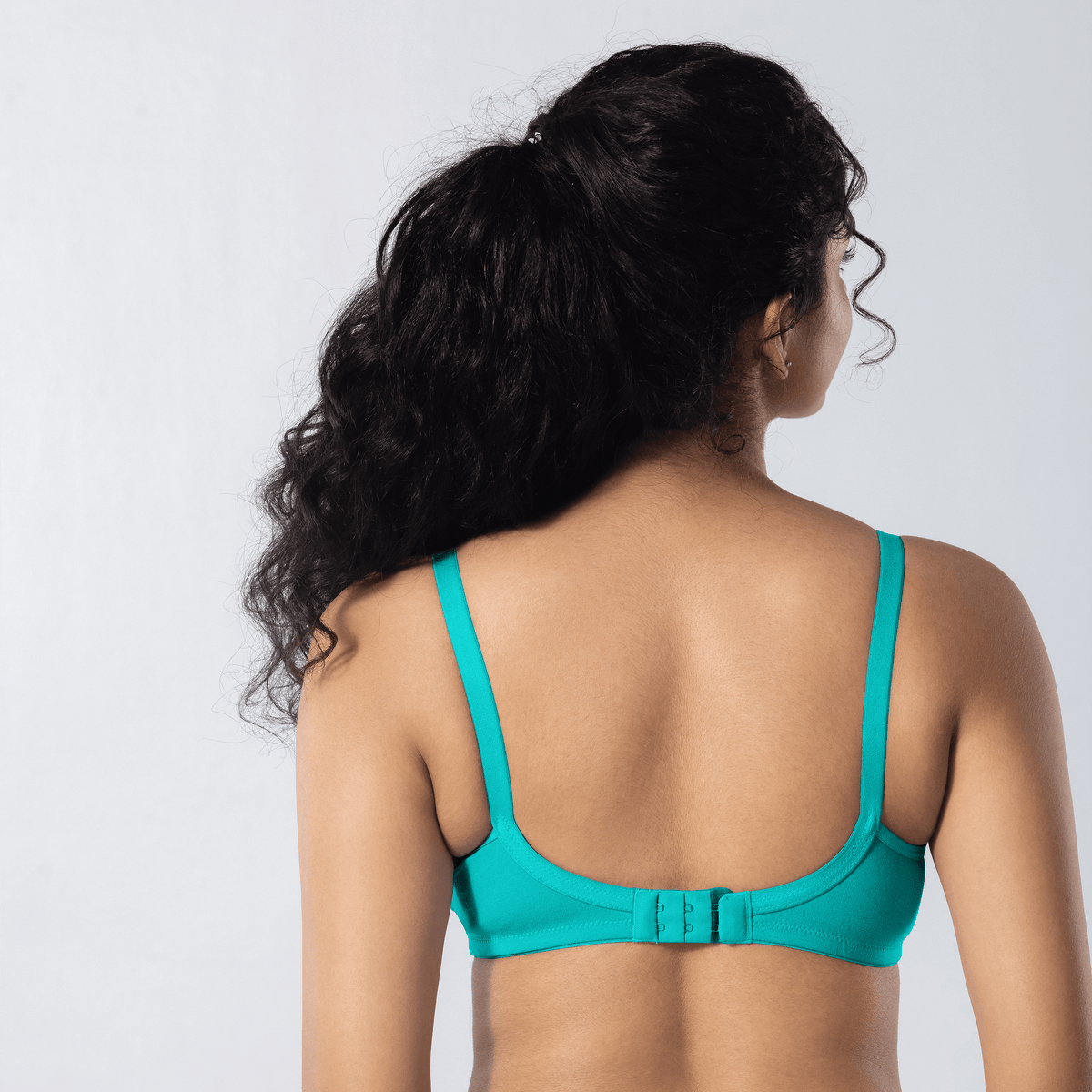 Emika-C Plus Bra in Pastel Green, back view worn by model.