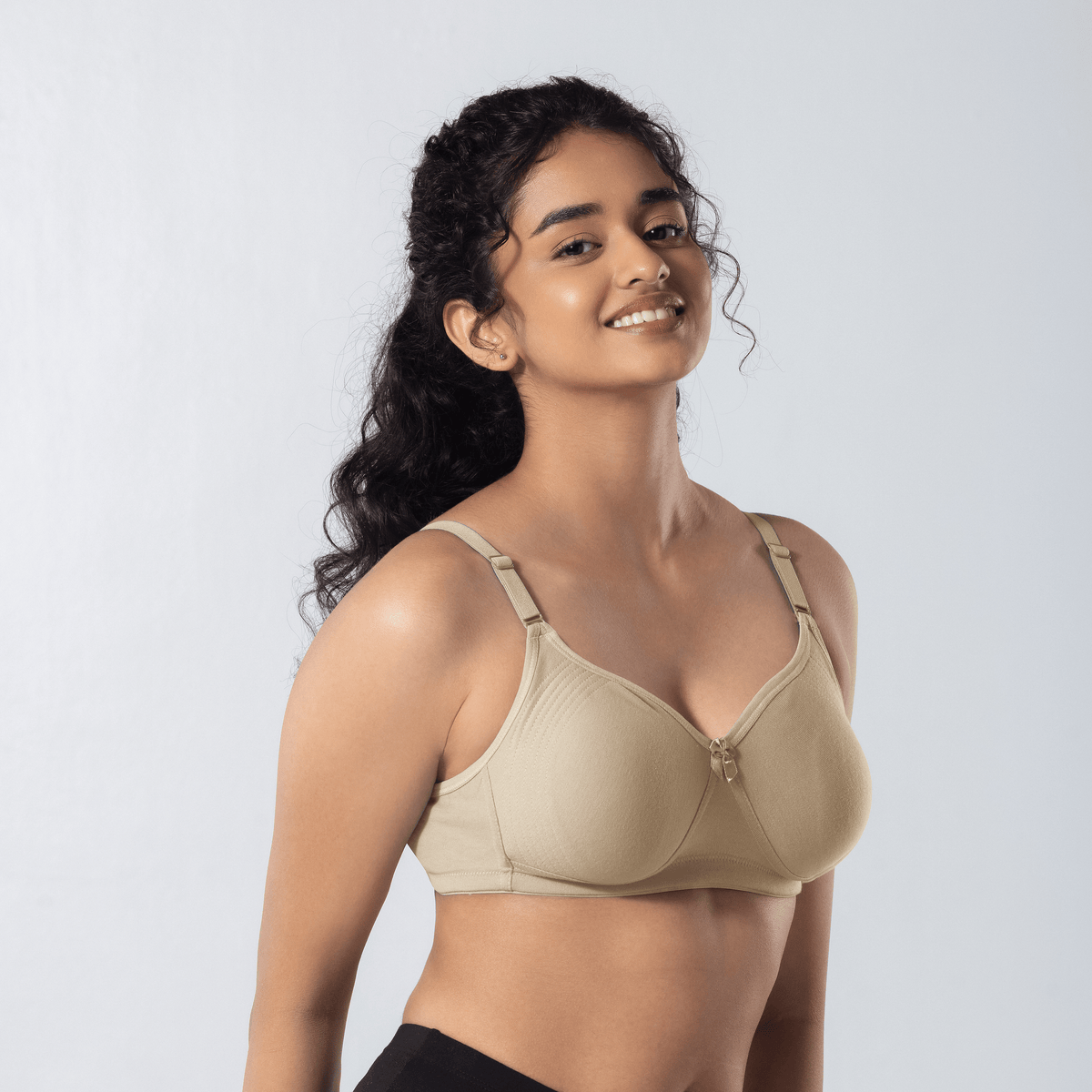 Emika-C Plus Bra in Skin, side-front view worn by model.