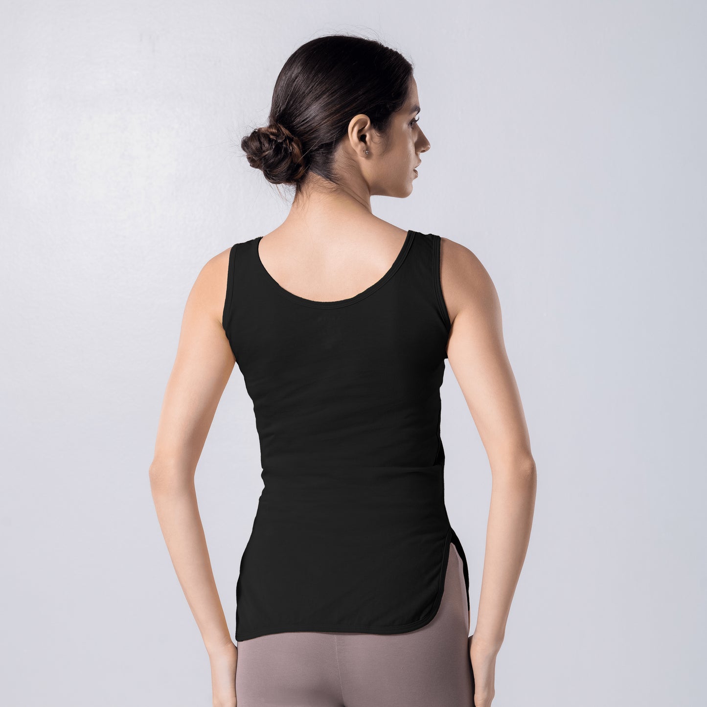 LadyO Tia Full Length Slip in black with rounded hem, back view worn by model.