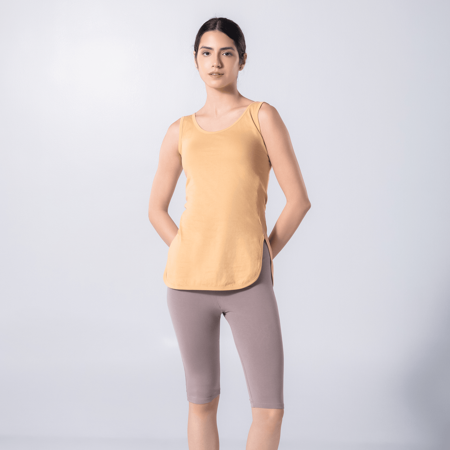 LadyO Tia Full Length Slip in skin color with side slits, front view worn by model.
