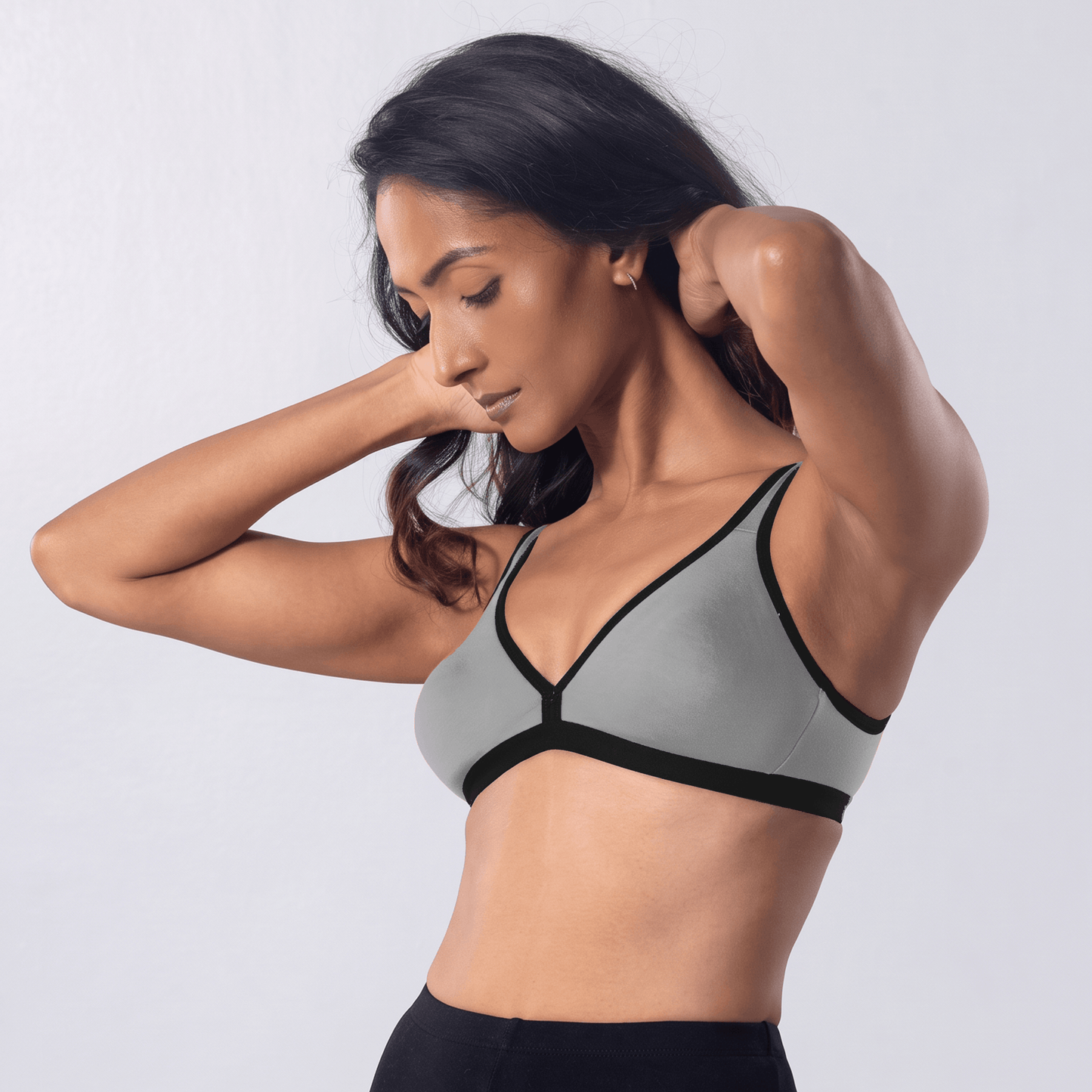 Grace Trendy Bra in Grey Melange, side view worn by model.