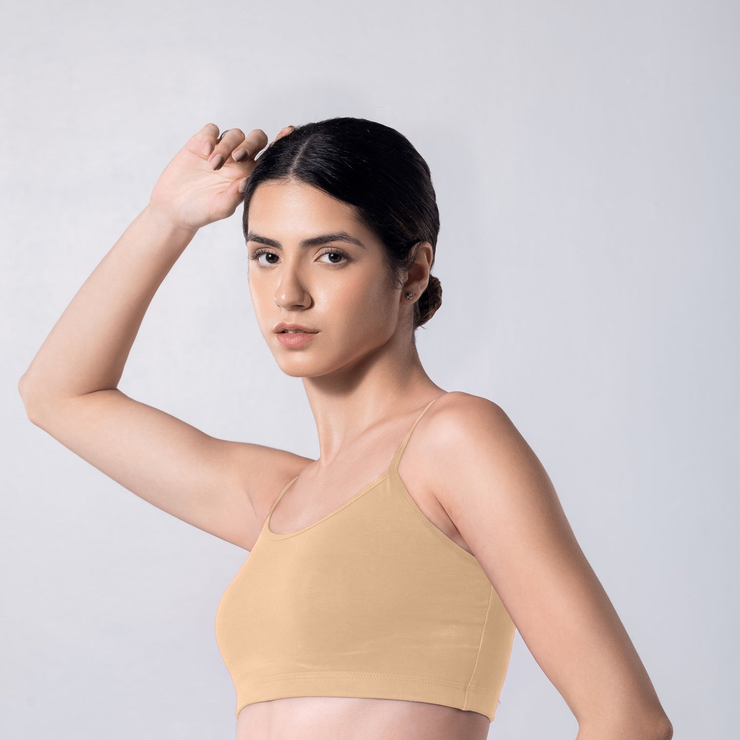 Blush Trendy Top Bra in Skin, side view worn by model.