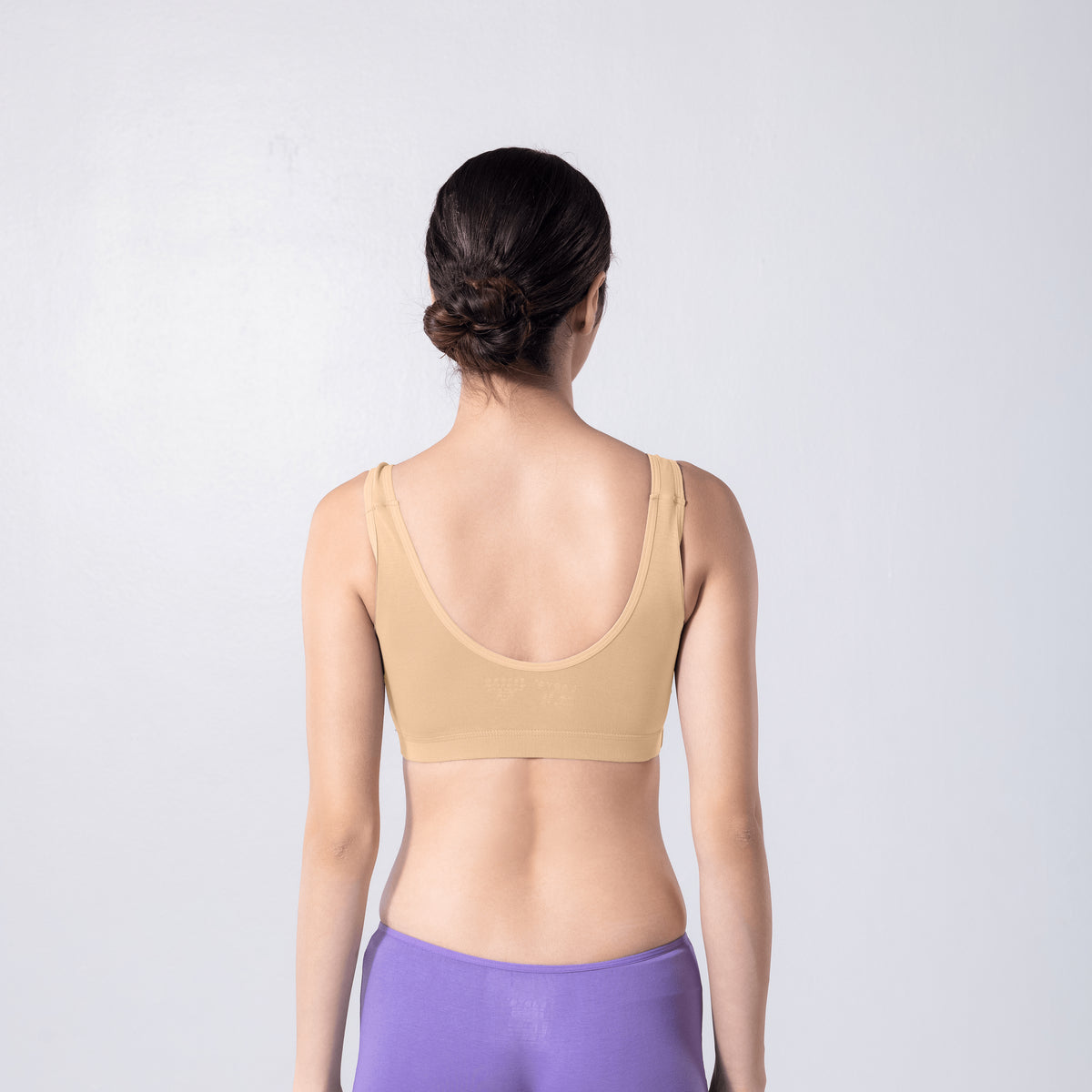 LadyO Cool Active Bra in Skin, back view worn by model.