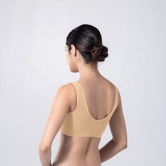 LadyO Cool Active Bra in Skin, three-quarter back view worn by model.