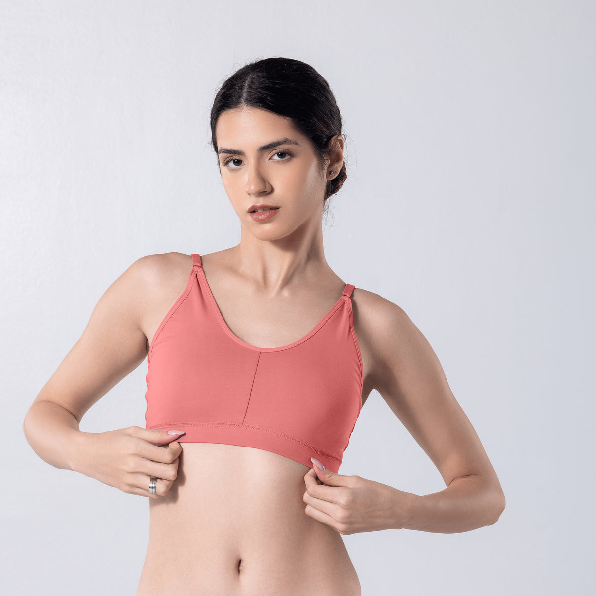 Feel Active Bra in Snow Copper, detailed shot worn by model.