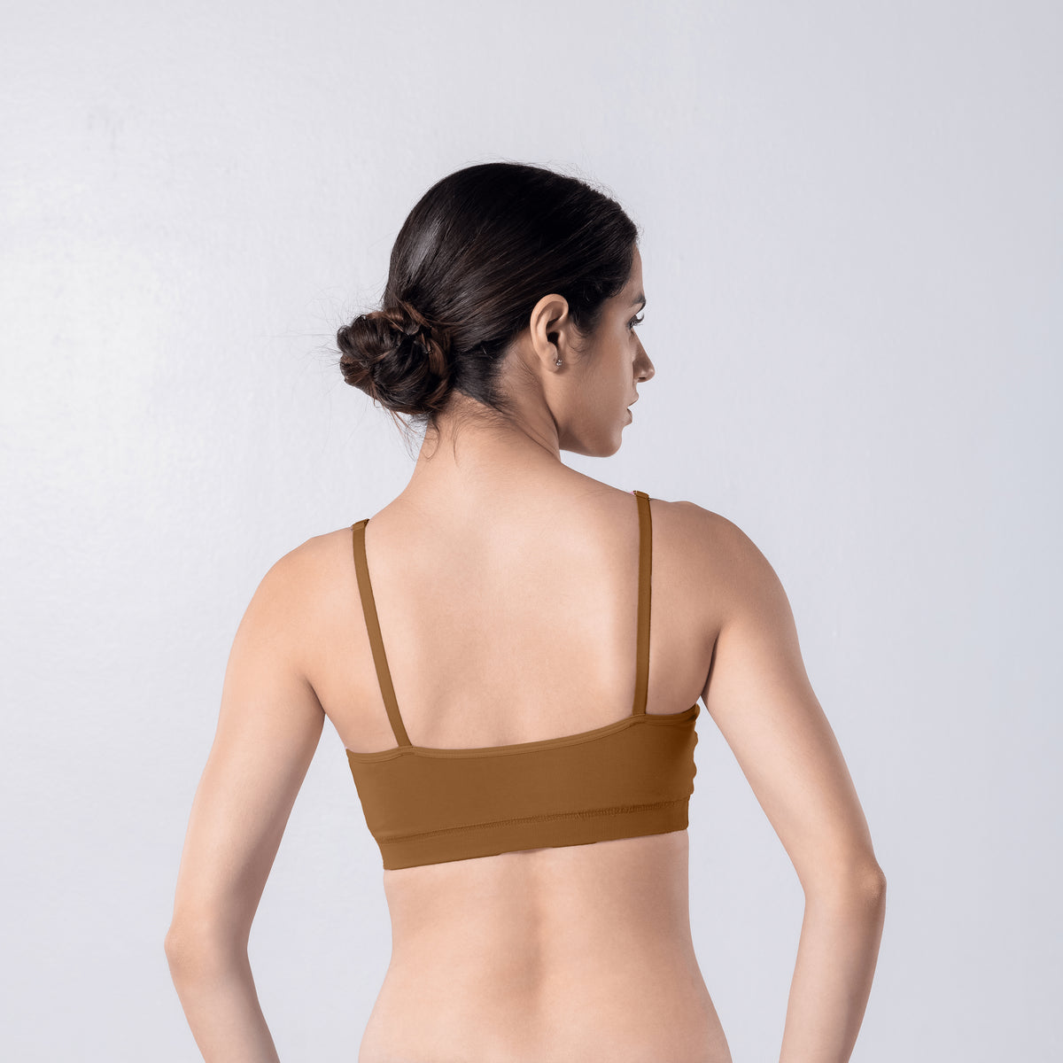 Feel Active Bra in Honey, back view worn by model.