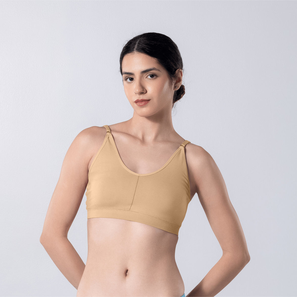 Feel Active Bra in Skin, front view worn by model.