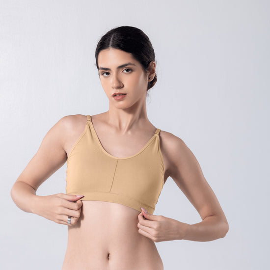 Feel Active Bra in Skin, detailed shot worn by model.