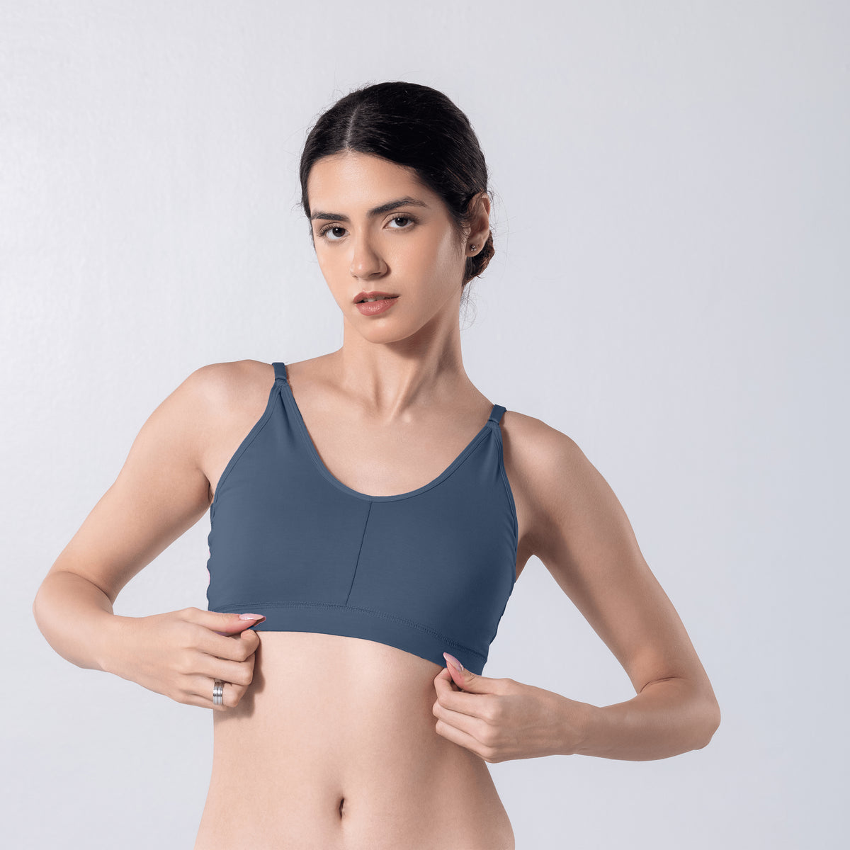 Feel Active Bra in Snow Steel Grey, detailed shot worn by model.