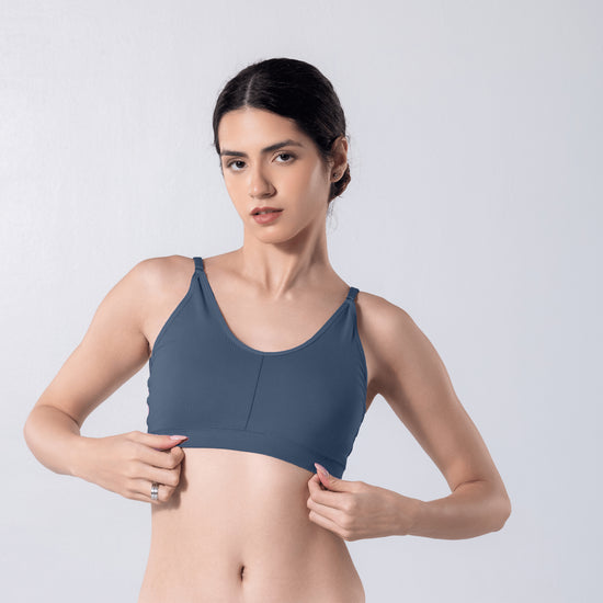 Feel Active Bra in Snow Steel Grey, detailed shot worn by model.