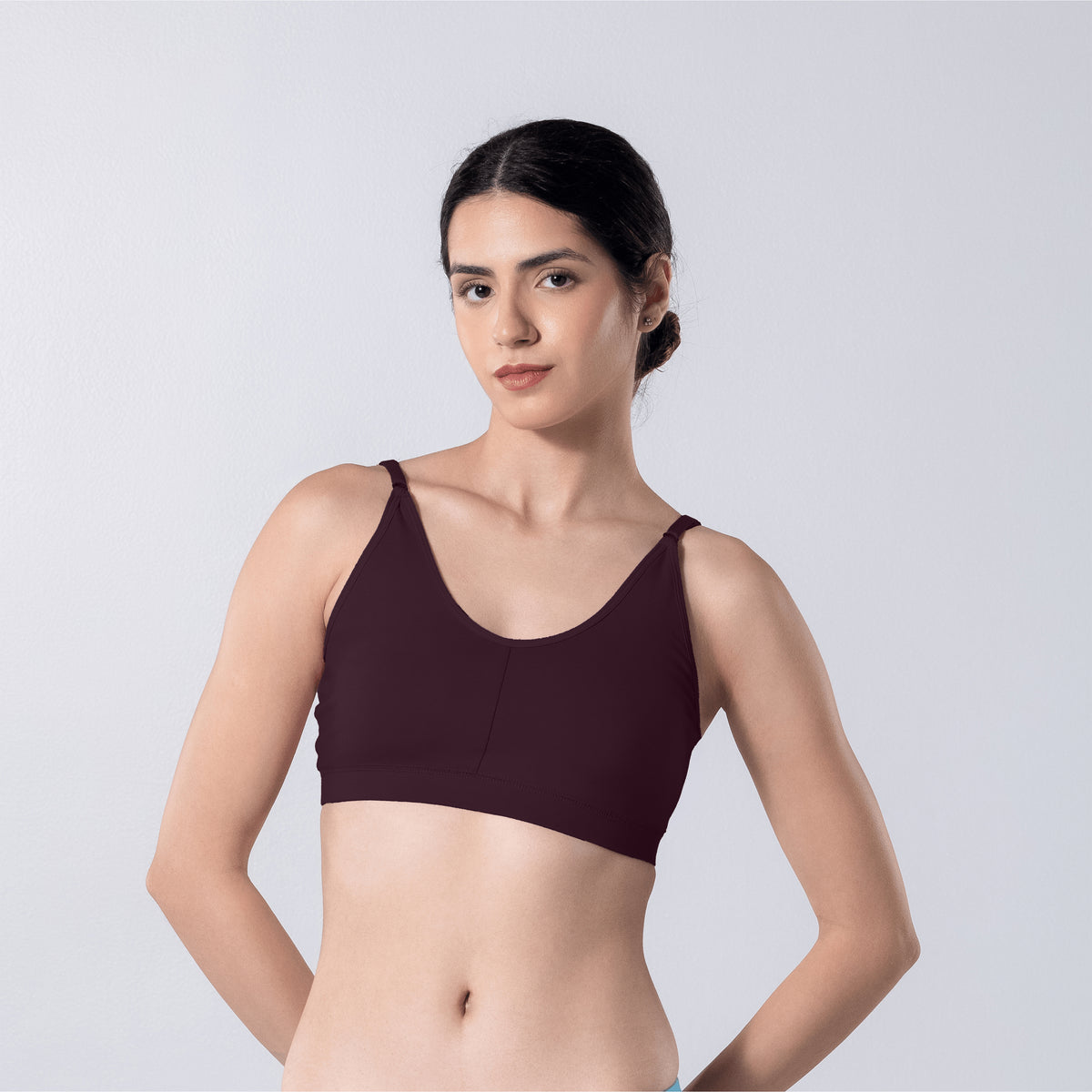 Feel Active Bra in Wine, front view worn by model.