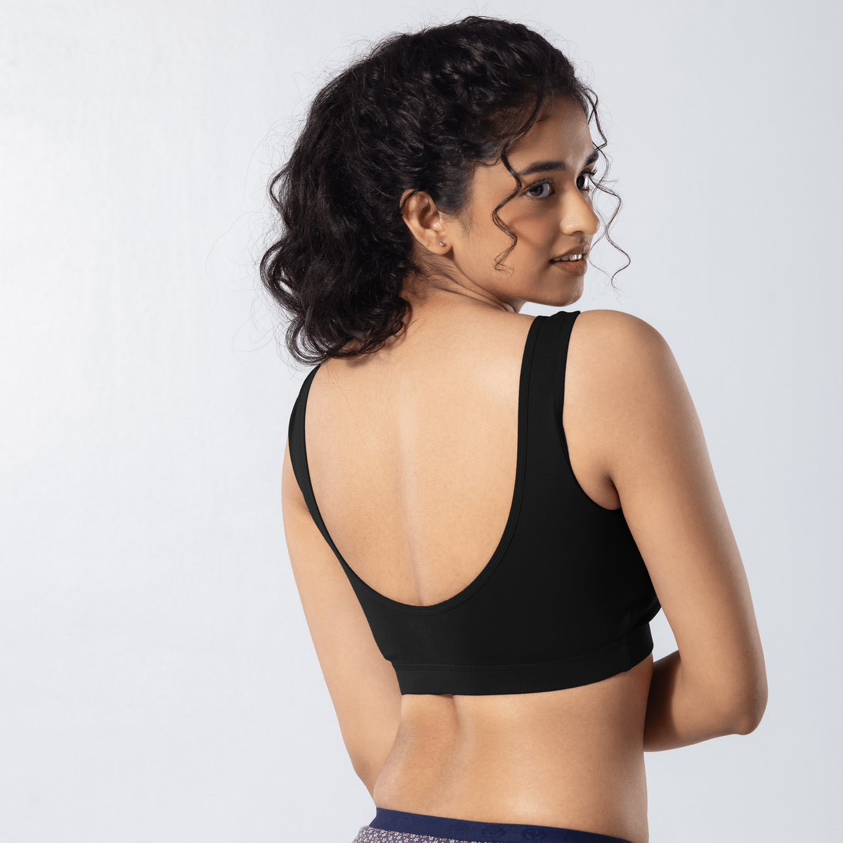 U-Back (N) Active Bra in Black, back side view worn by model.