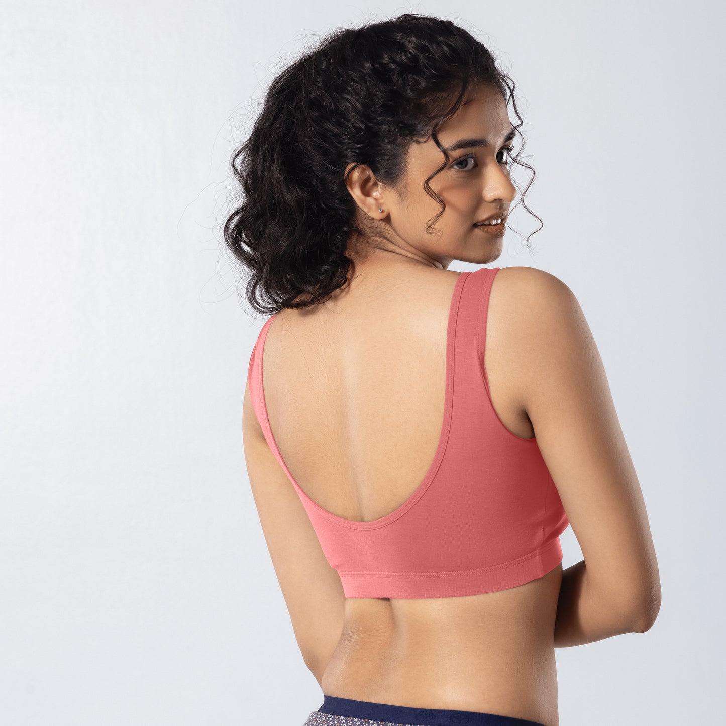 U-Back (N) Active Bra in Copper, side back view worn by model.