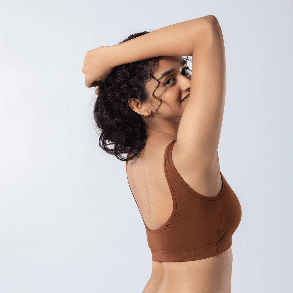 U-Back (N) Active Bra in Honey, side view worn by model.