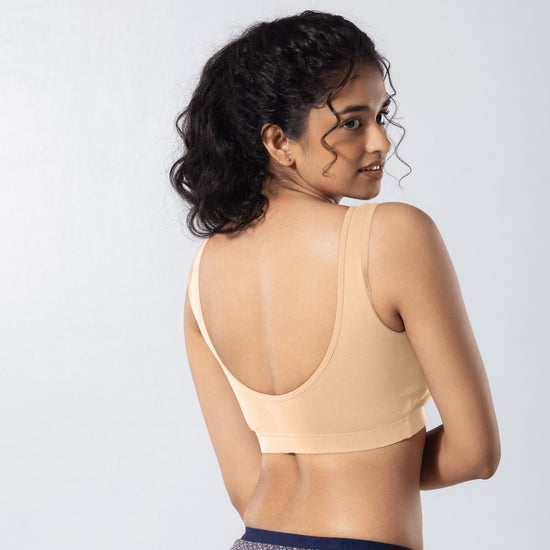 U-Back (N) Active Bra in Skin, back side view worn by model.