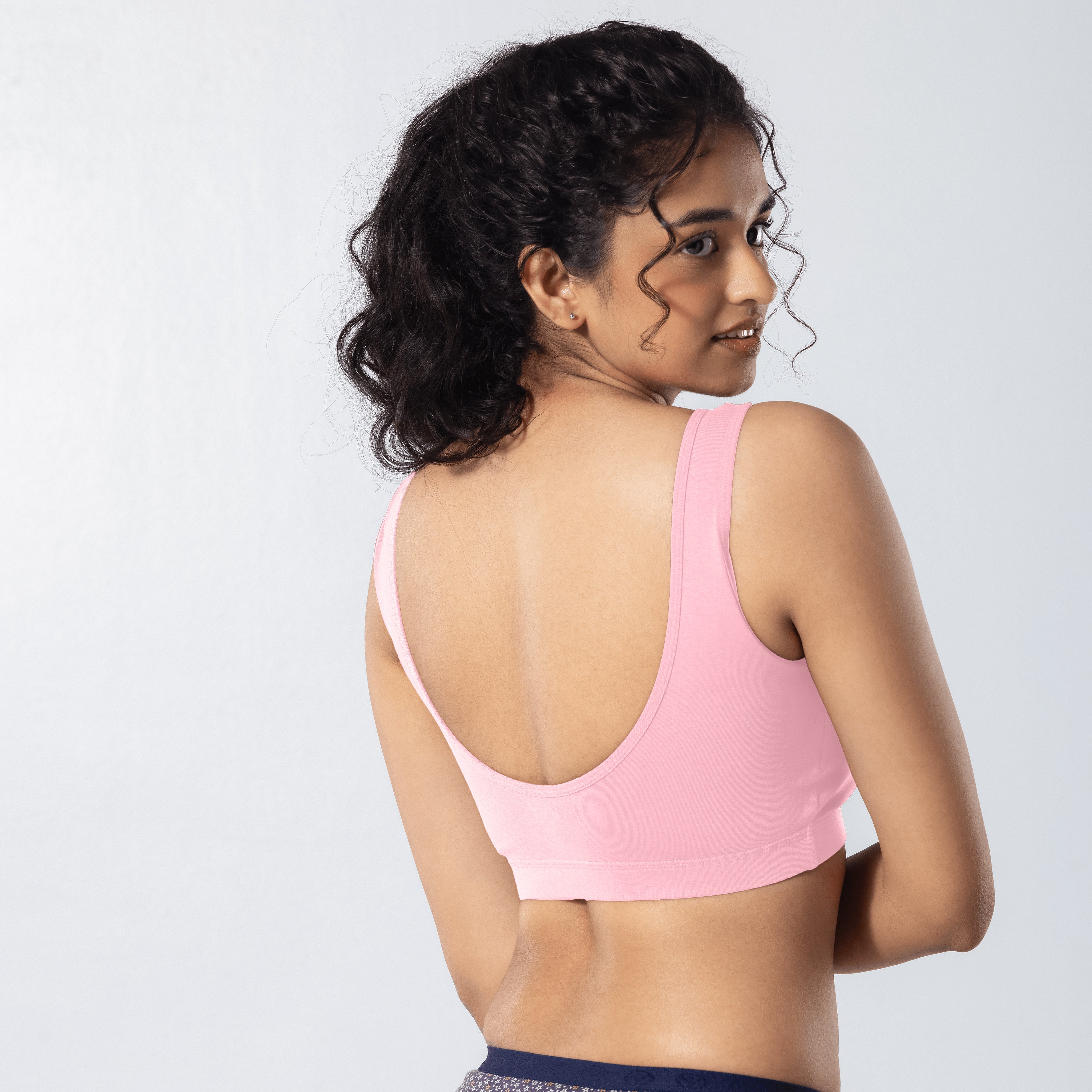 U-Back (N) Active Bra in Snow Pink, side back view worn by model.