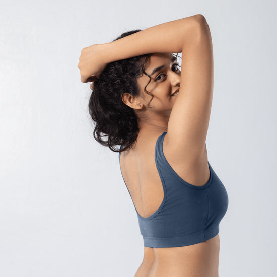 U-Back (N) Active Bra in Steel Grey, side view worn by model.