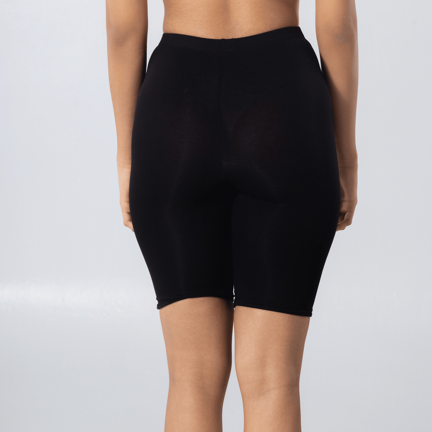 LadyO Aldo Tights in Black, back view worn by model.