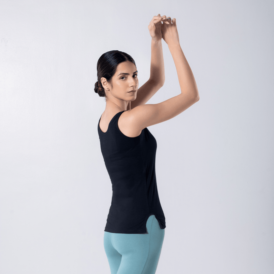 LadyO Alexa-F Mid Length Tank Top in Black, side pose worn by model.