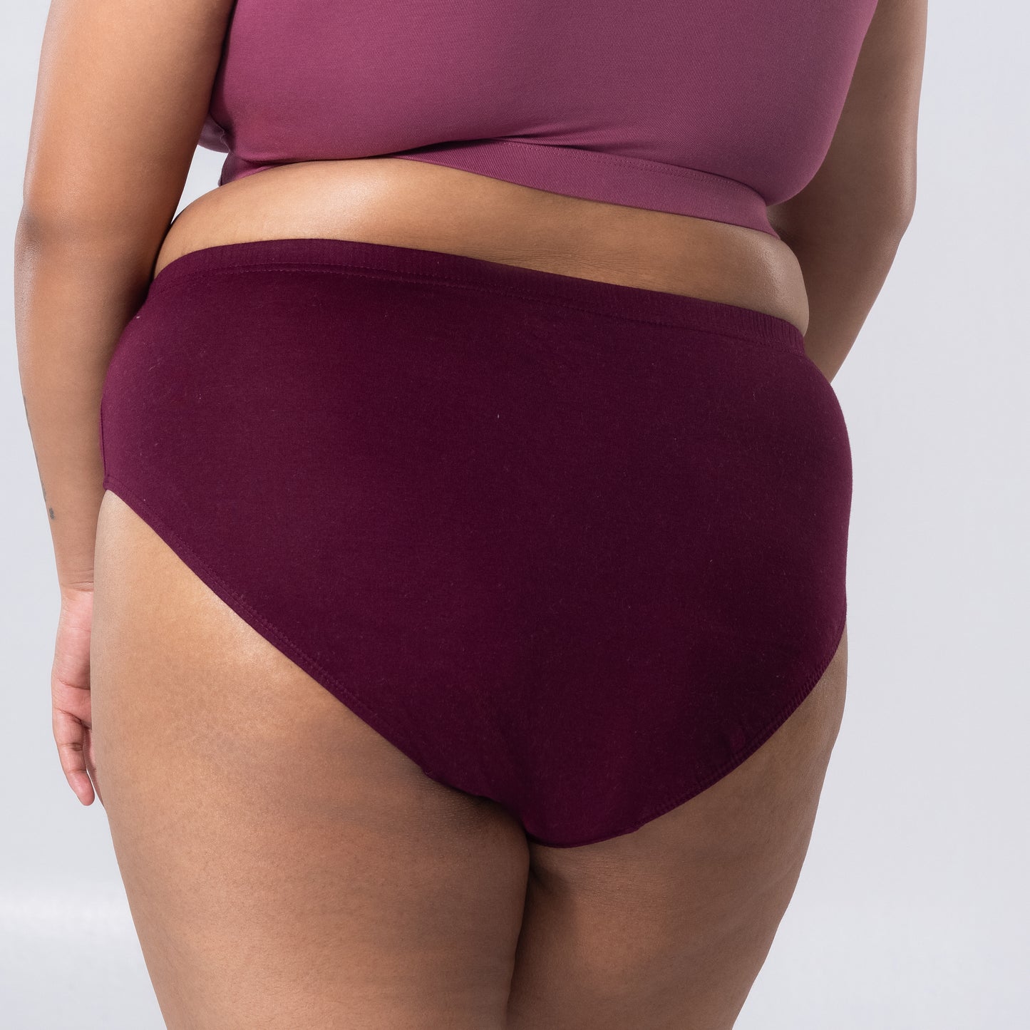 Liva Full Brief Panty left side-back view in alternate color worn by model
