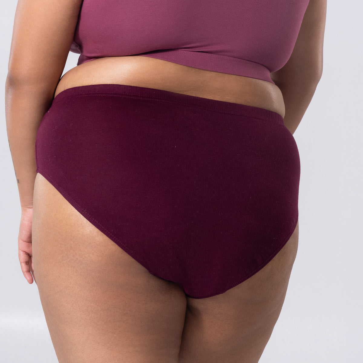 Liva Full Brief Panty left side-back view in alternate color worn by model