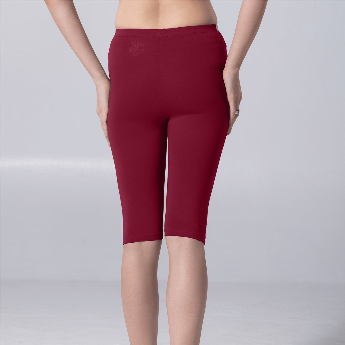 Noa (N) Tights in Maroon back view worn by model