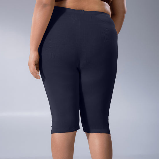 Noa Plus Tights in Navy, back view worn by model.