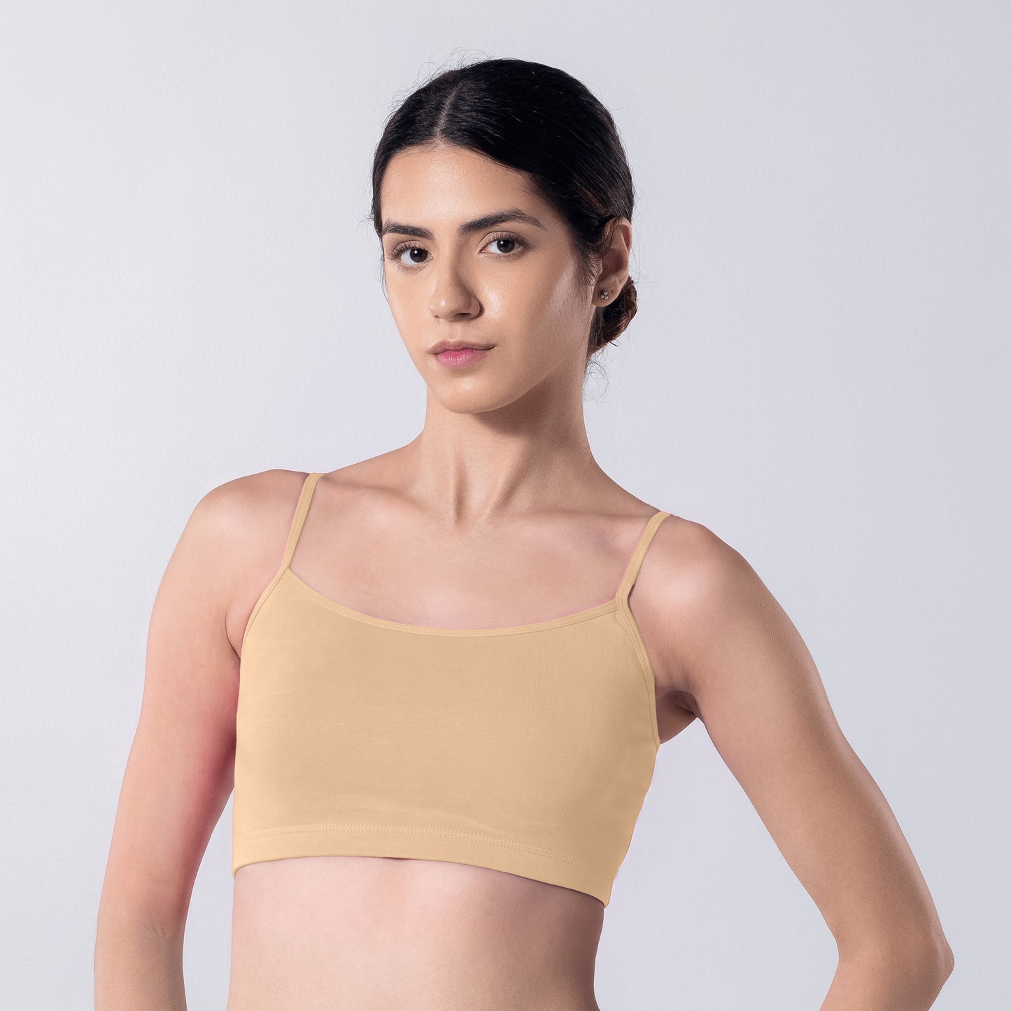Blush Trendy Top Bra in Skin, side view worn by model.
