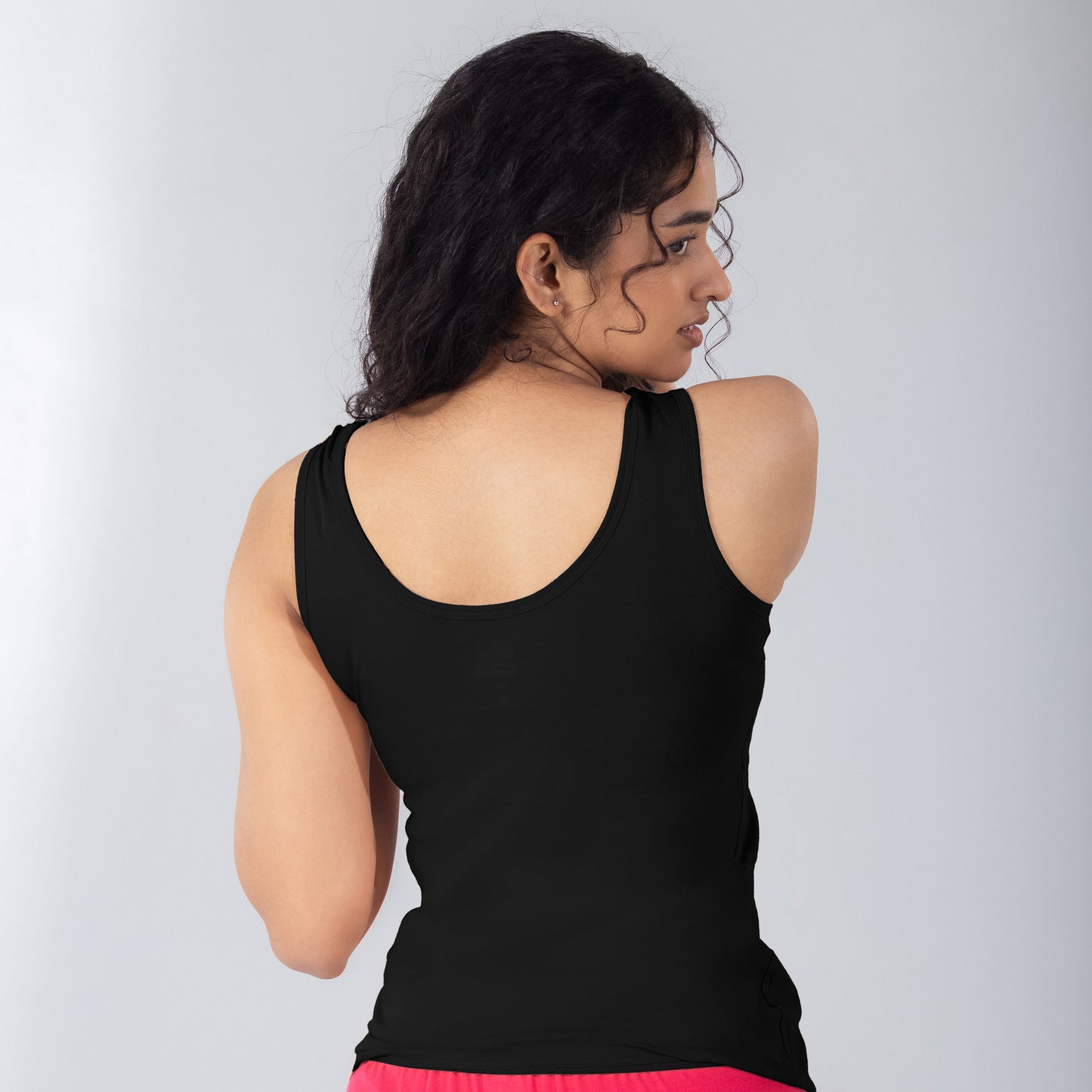 LadyO Petal (N) Mid Length Tank Top in Black, back view worn by model.