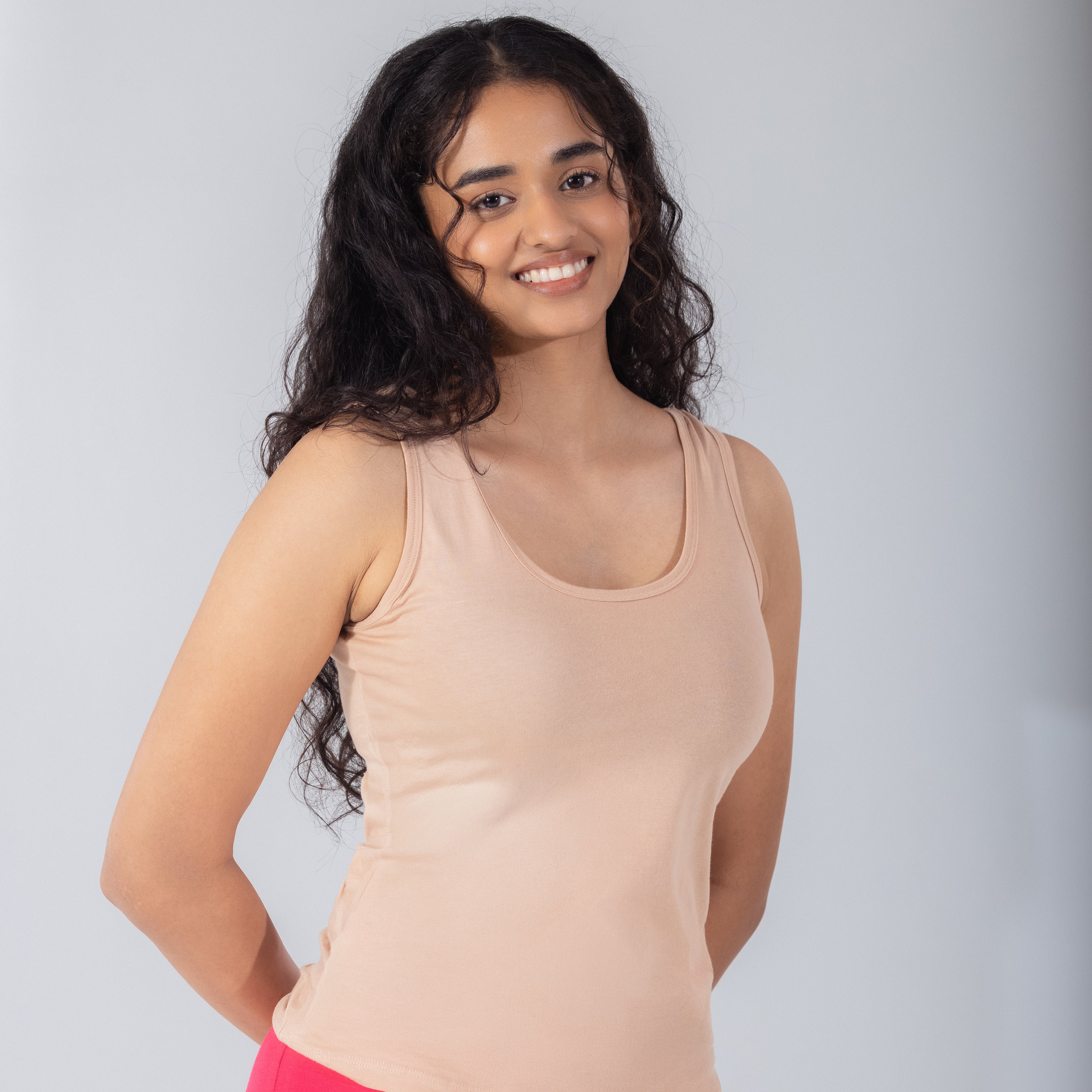 LadyO Petal (N) Mid Length Tank Top in Skin, side view worn by model.