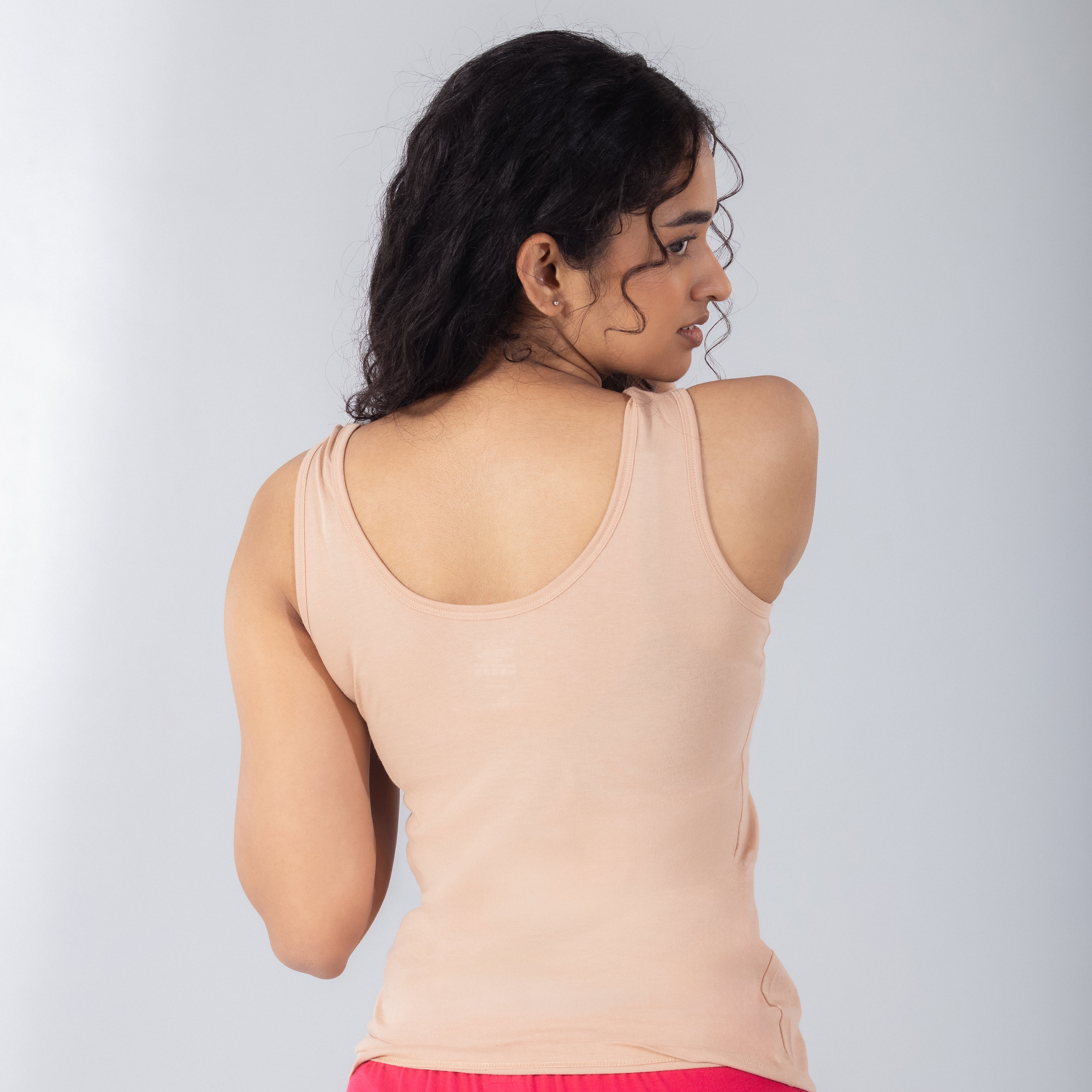 LadyO Petal (N) Mid Length Tank Top in Skin, back view worn by model.