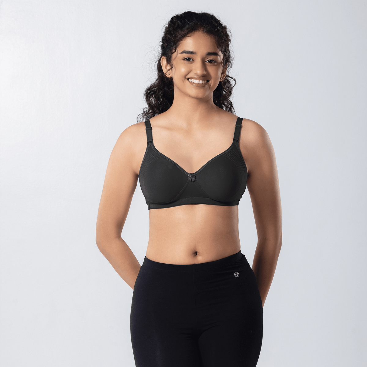 Emika-C Plus Bra in DK Grey, front view worn by model.