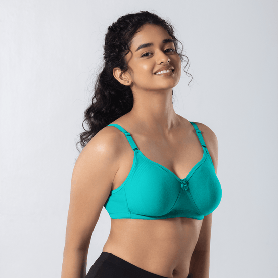 Emika-C Plus Bra in Pastel Green, side-front view worn by model.