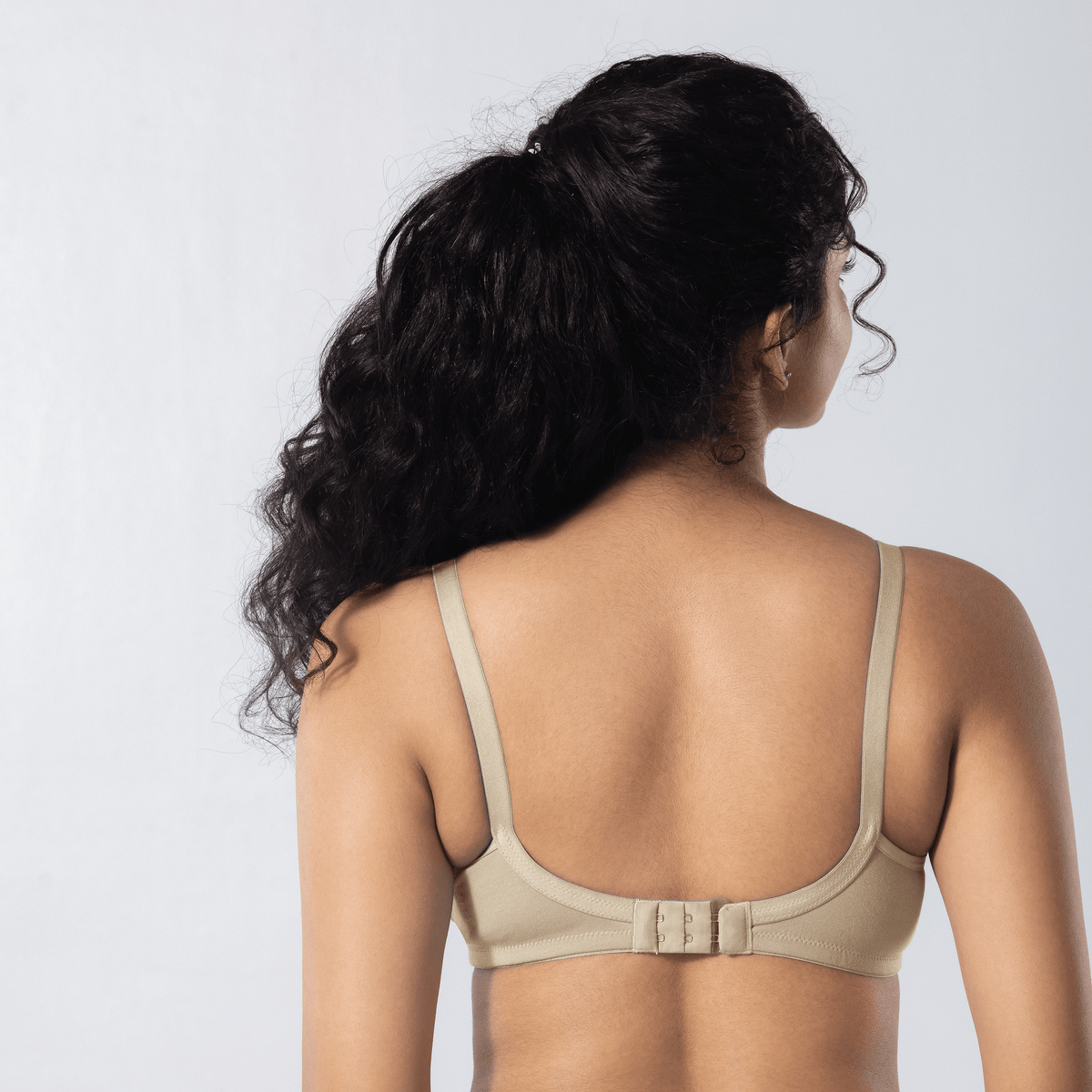 Emika-C Plus Bra in Skin, back view worn by model.