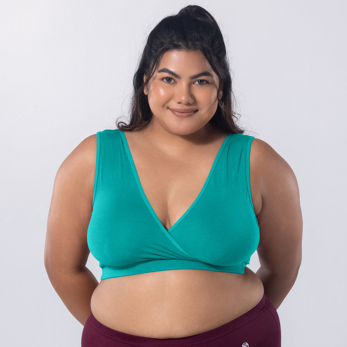 Sleeping Bra in Pastel Green, front view worn by model.