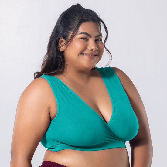 Sleeping Bra in Pastel Green, side view worn by model.