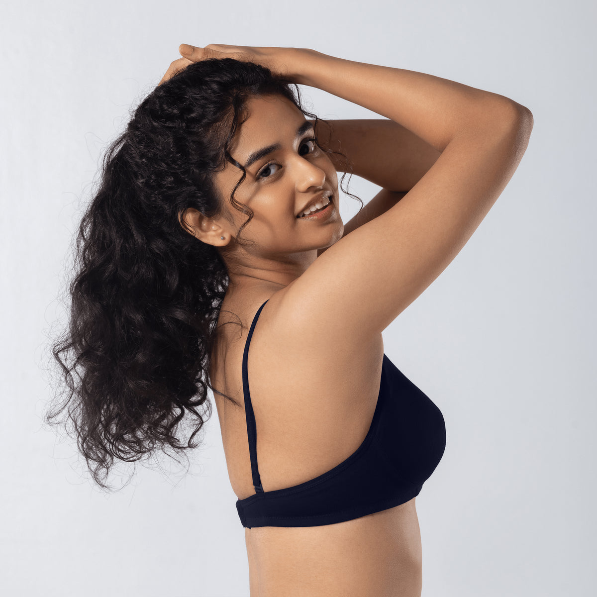 Mabel Soft Padded Bra in Navy side-back view worn by model.
