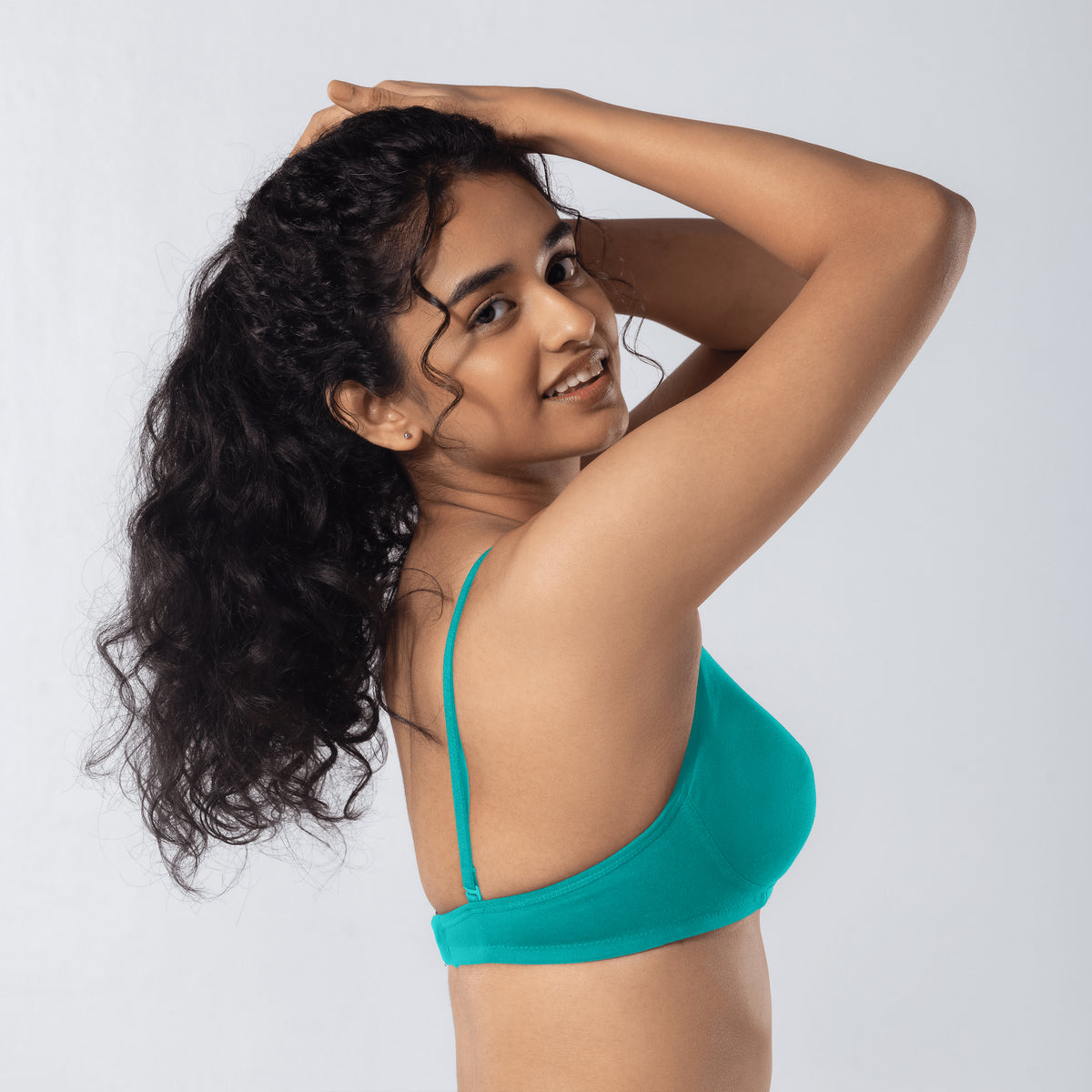 Mabel Soft Padded Bra in Pastel Green side-back view worn by model.
