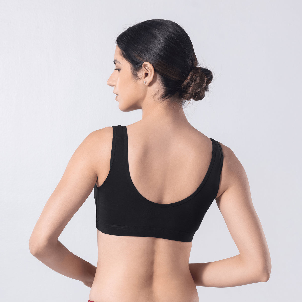 LadyO Hazel Sports Padded Bra in Black, back view worn by model.