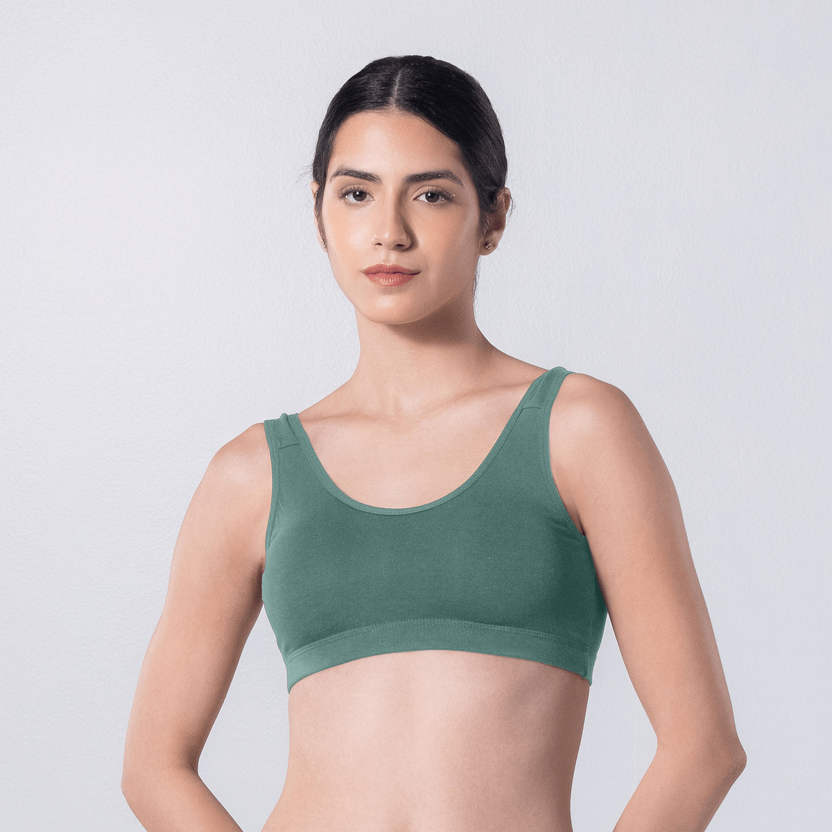 LadyO Hazel Sports Padded Bra in Pastel Green, front view worn by model.