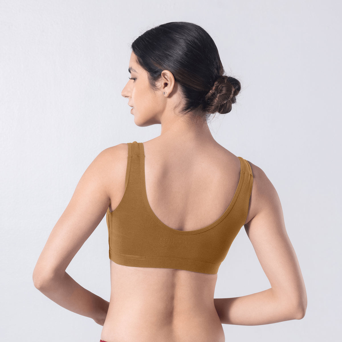 LadyO Hazel Sports Padded Bra in Skin, back view worn by model.