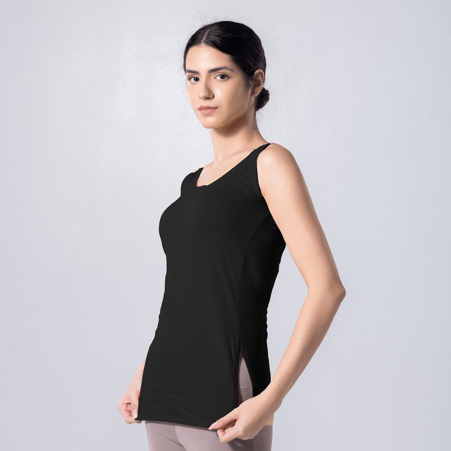 LadyO Tia Full Length Slip in black with side slits, front view worn by model.
