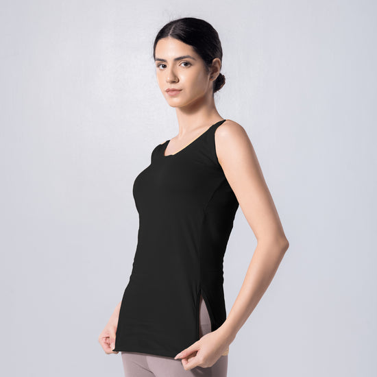 LadyO Tia Full Length Slip in black with side slits, front view worn by model.