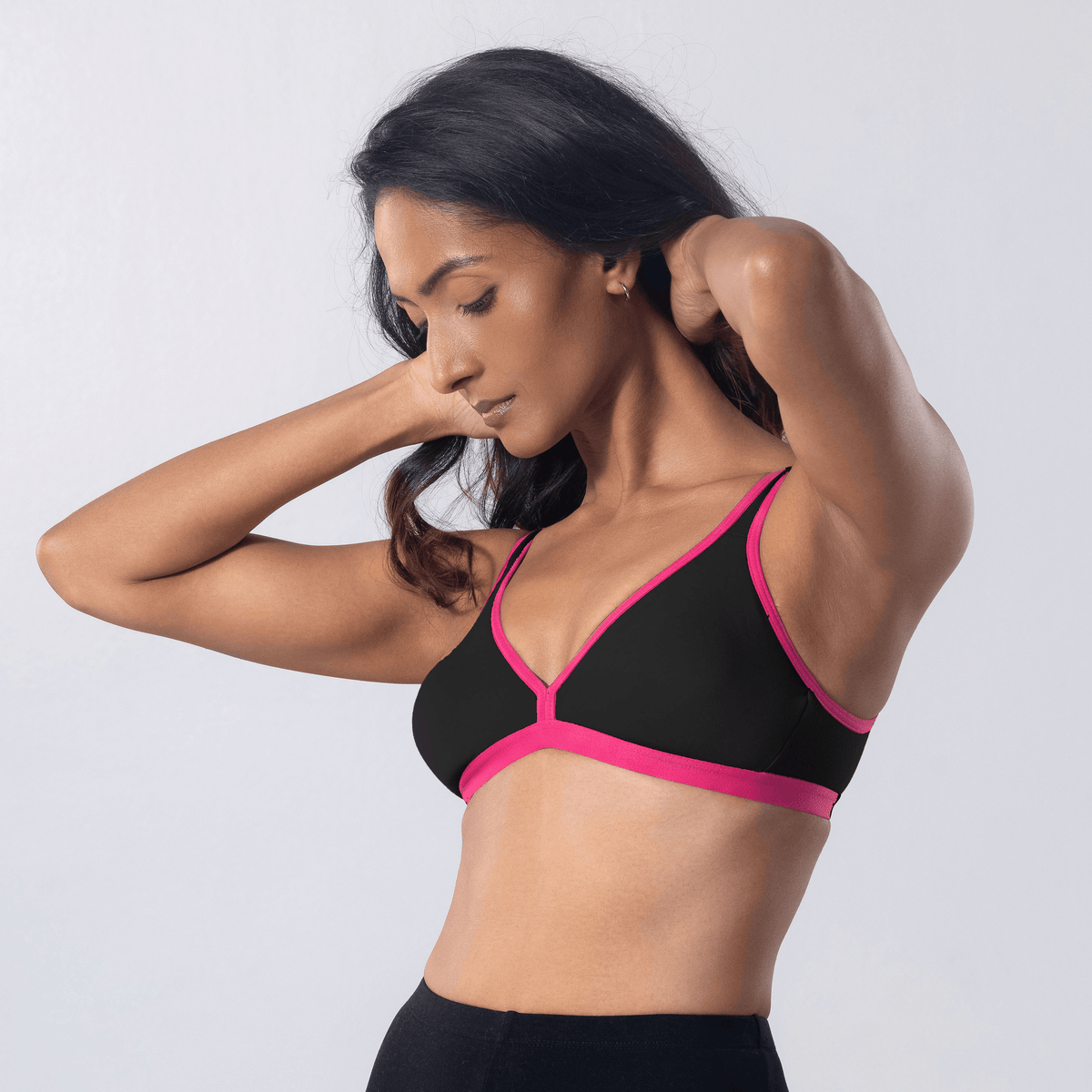 Grace Trendy Bra in Navy, side view worn by model.
