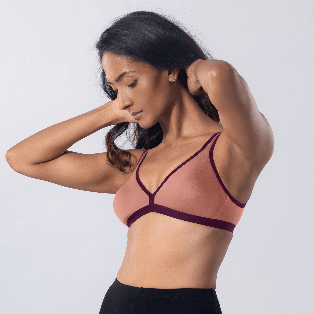 Grace Trendy Bra in Peach, side view worn by model.