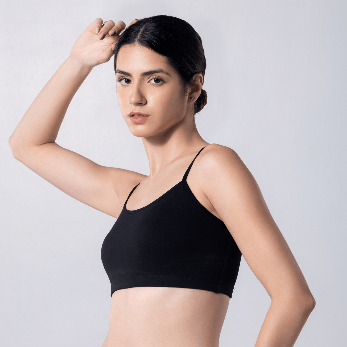 Blush Trendy Top Bra in Black, side view worn by model.